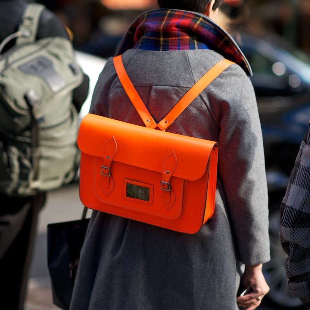THE CAMBRIDGE SATCHEL COMPANY Neon Leather Backpack in Orange